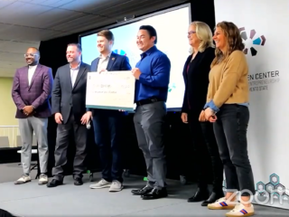 David Nguyen, cofounder of BrainScanology, with his first place Spark Venture Competition award of $7500!